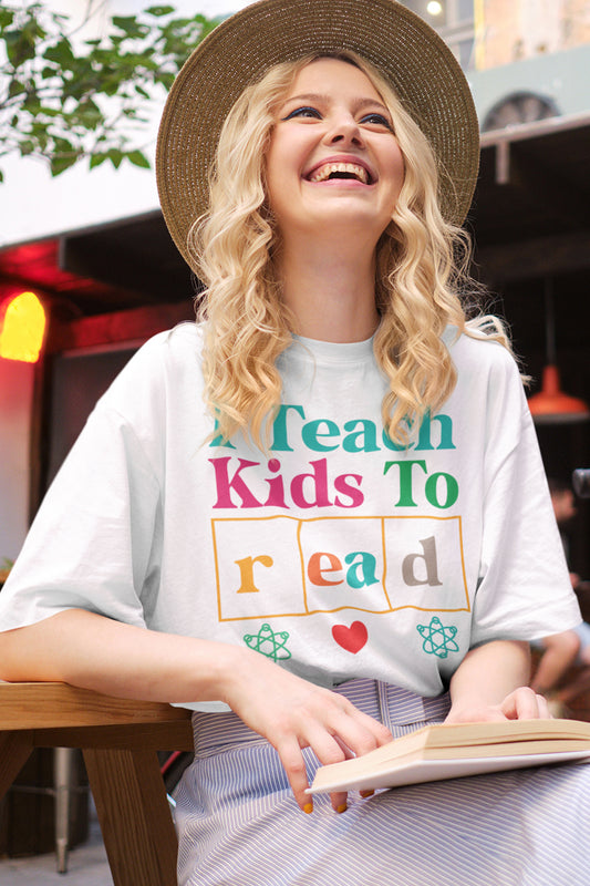 I Teach Kids To Read Teacher Shirt